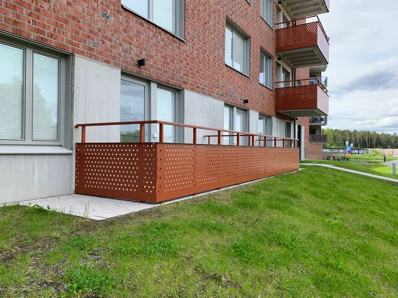 Aluminum balcony railings with perforated infill — photo 1