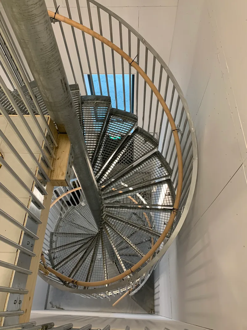 Custom-designed staircases with tiled treads — photo 7
