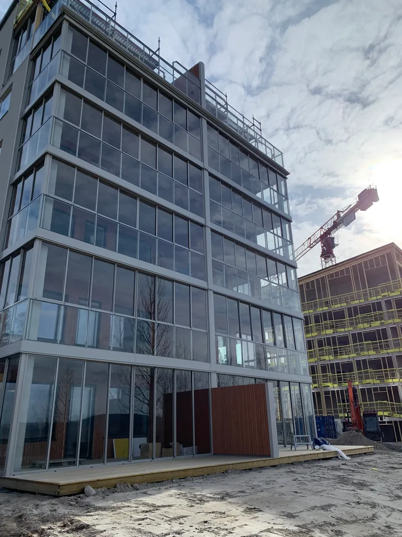 Fully glazed aluminum balcony railings with sliding frame panels — photo 4