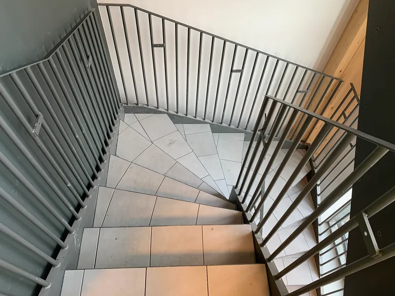 Custom-designed staircases with tiled treads — photo 9